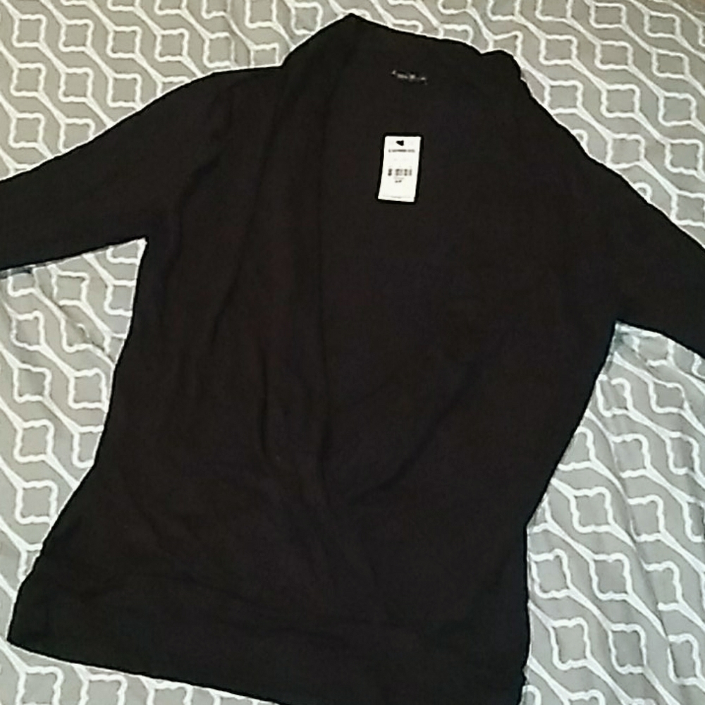 Its a soft light weight Jacket/ shirt; size S/P.